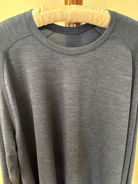 Men’s Lululemon long sleeve performance shirt.
